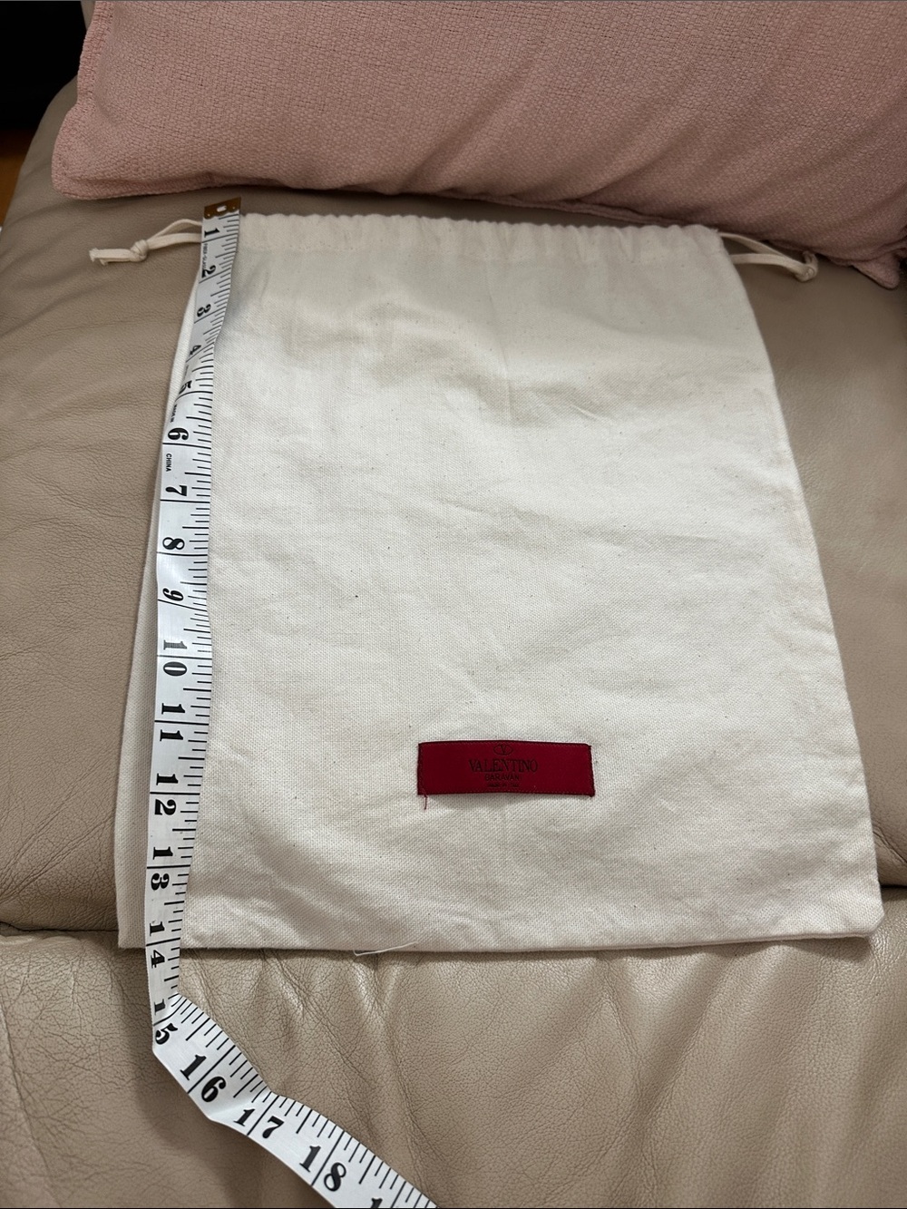 Valentino Garavani Cream Cotton Drawstring Bag with Red Logo Patch